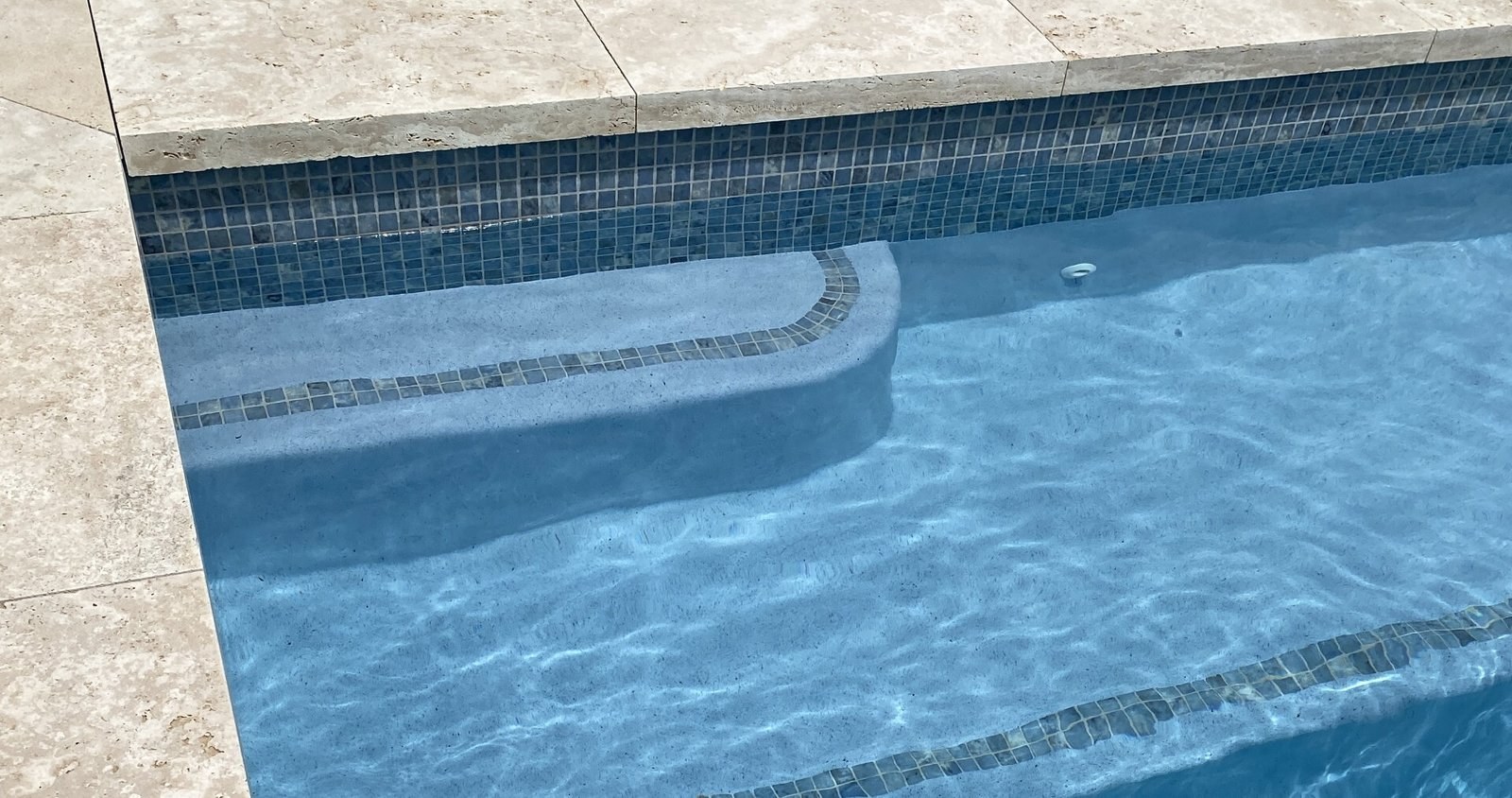 The Concrete Pool Co. - concrete pool with tiled steps, pool builders in Auckland